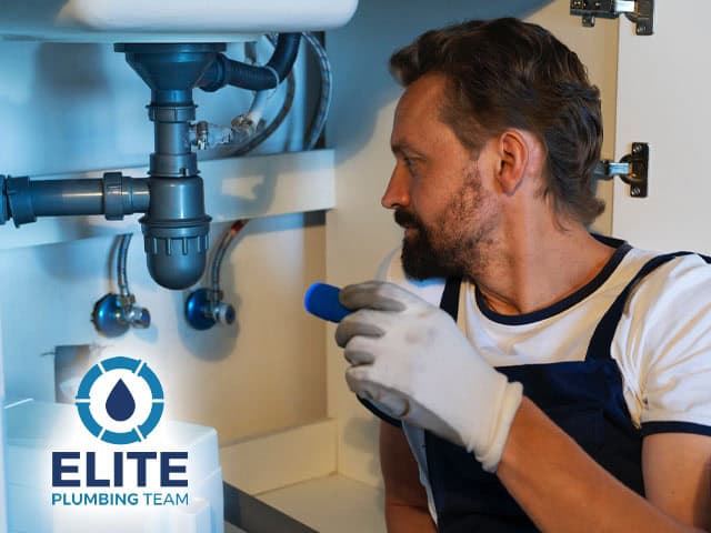 professional plumber plumbing repairs examining pipes water pressure